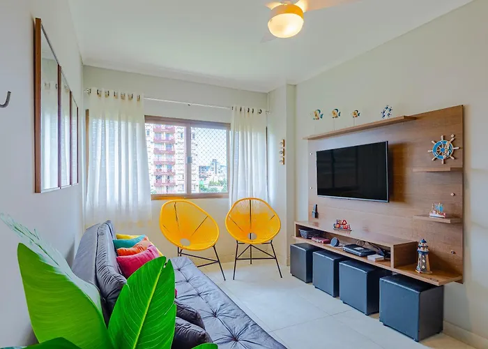 Apê Famoso com Ar e Garagem coberta Apartamento Guarujá